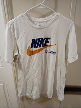 Nike White Short-Sleeve Tee with Navy Logo and Gold Swoosh